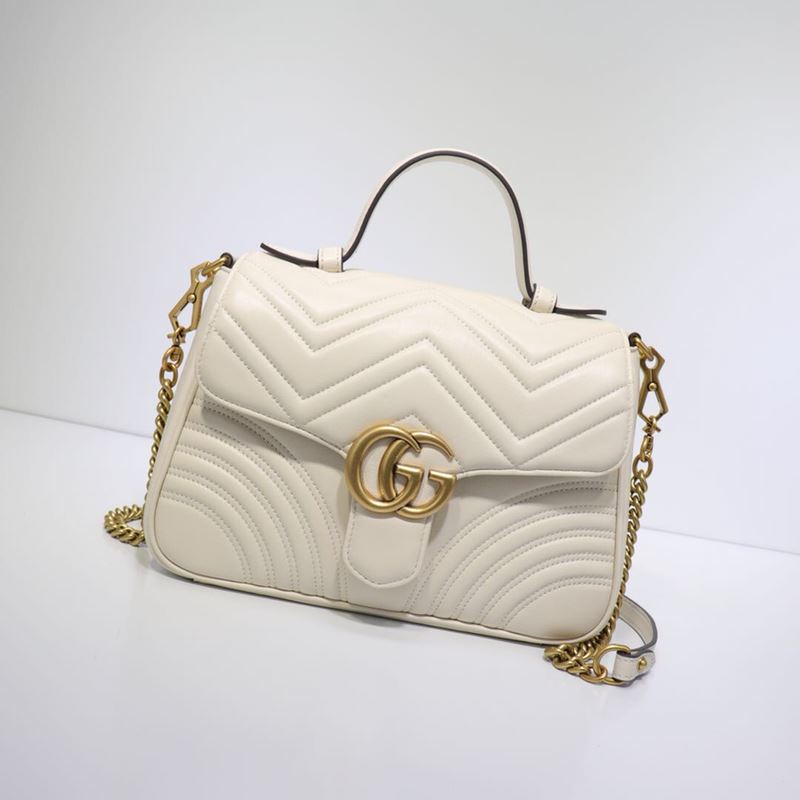 G*u*i top handle bags